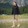 Women's lightweight hardshell rain jacket for trail - black hardshell jacket, walking on grass, for hiking and trail walking