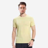 
                  
                    Soft merino wool baselayer with temperature control - yellow merino wool baselayer tee on men, for layering in cold weather
                  
                
