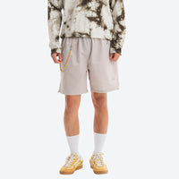 
                  
                    Water-repellent running shorts with drawcord waist - light gray running shorts with tie-dye top, front standing view
                  
                