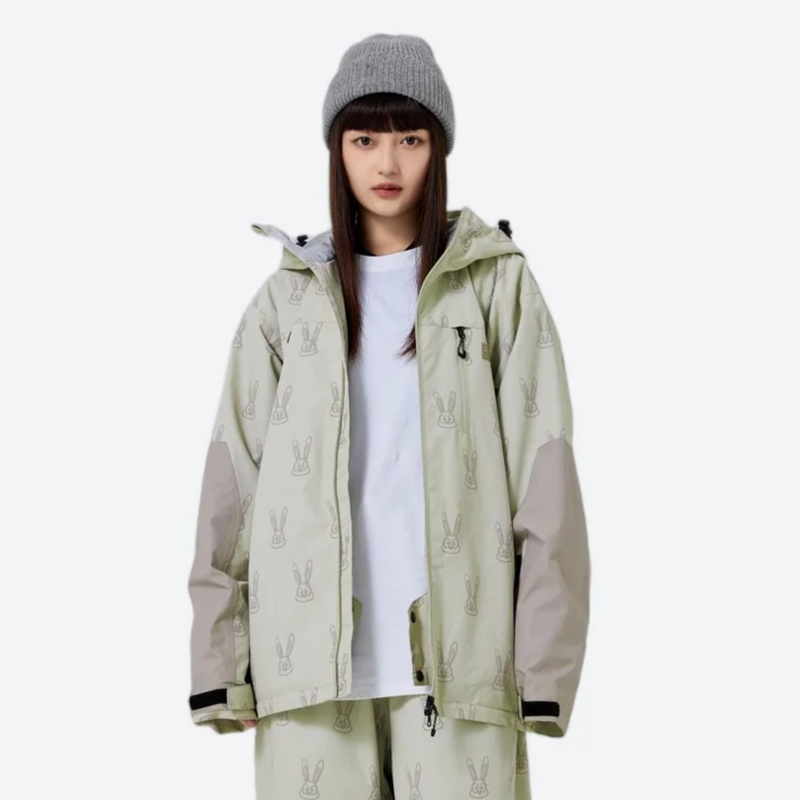 Women's 2-layer snowboard jacket and pants - sage green rabbit print jacket with white tee, front view with open jacket