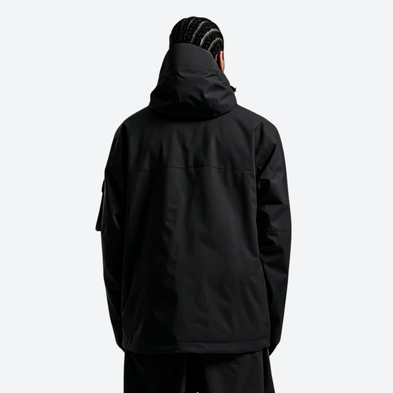 Men's breathable 2-layer snowboard jacket and pants - black, on-model back hood view, for powder days and winter commute