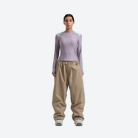 
                  
                    Women's 2-layer snowboard jacket and pants - lavender base layer top with tan snow pants, for resort and street wear
                  
                