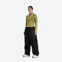 
                  
                    Women's breathable ski jacket set - olive green base layer top with black snow pants, for cold-weather winter sports
                  
                