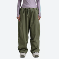 
                  
                    Women's waterproof 2L snow jacket and pants - olive green snow pants, on-model front view, for skiing and snowboarding
                  
                