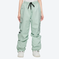 
                  
                    Men's 2-layer snowboard jacket and pants - sage green snow pants, on-model front view, for powder days and winter commute
                  
                