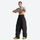 Unisex snowboard jacket and pants set - black snow pants, waistband close-up with lifted top, for skiing and snowboarding