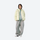 Unisex ultralight packable down vest and jacket - cream yellow ultralight down jacket on women, front standing view