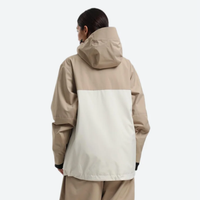 
                  
                    Women's waterproof 2L snow jacket and pants - tan and cream colorblock, on-model back hood view, for resort and street wear
                  
                