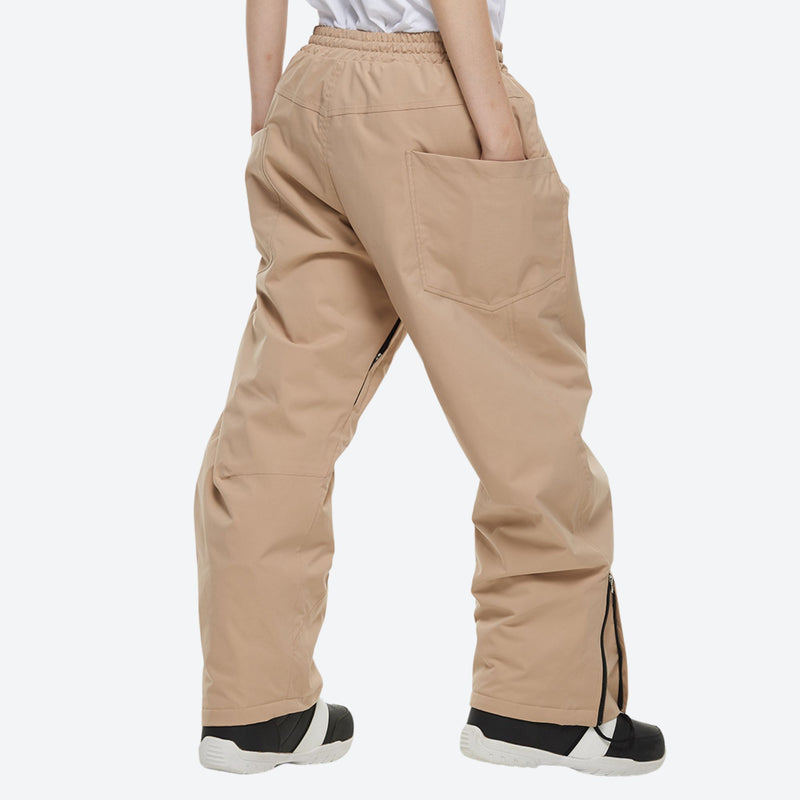 Breathable anorak ski jacket in candy colors - tan snow pants, on-model back view, for cold-weather winter sports