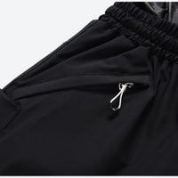 
                  
                    Unisex waterproof 2L snow jacket and pants - black snow pants, zip pocket close-up detail, for powder days and winter commute
                  
                