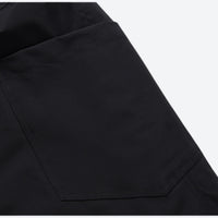 
                  
                    Breathable anorak ski jacket in candy colors - black snow pants, panel seam close-up detail, for cold-weather winter sports
                  
                