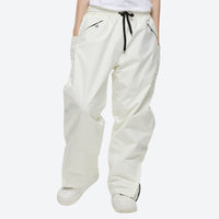 
                  
                    Breathable anorak ski jacket in candy colors - white snow pants, on-model front view, for skiing and snowboarding
                  
                