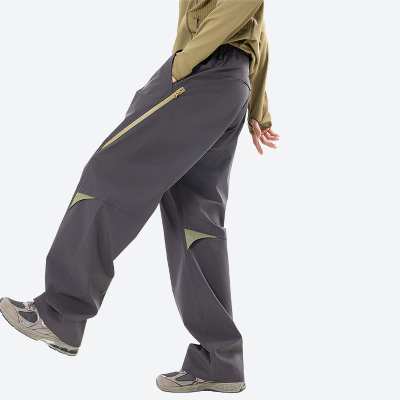 Breathable quick-dry trail pants with cargo pockets - dark gray cargo hiking pants with olive top, stride side view