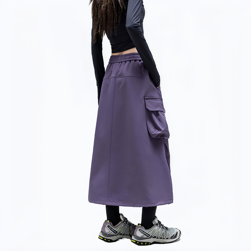 Versatile water-repellent cargo skirt - purple cargo long skirt on women, side standing view, for hiking and trail walking