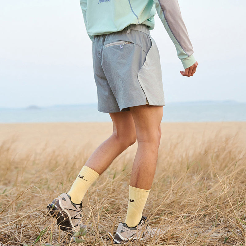 Unisex water-repellent shorts with breathable liner - light blue water-repellent shorts with mint top