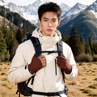 
                  
                    Merino wool thermal gloves for cold weather - brown merino wool thermal gloves on men with backpack, front standing view
                  
                