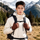Merino wool thermal gloves for cold weather - brown merino wool thermal gloves on men with backpack, front standing view