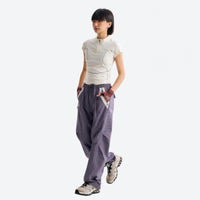 
                  
                    Women's quick-dry tee with UV protection - white quick-dry tee with slimming panels, for hiking and trail walking
                  
                