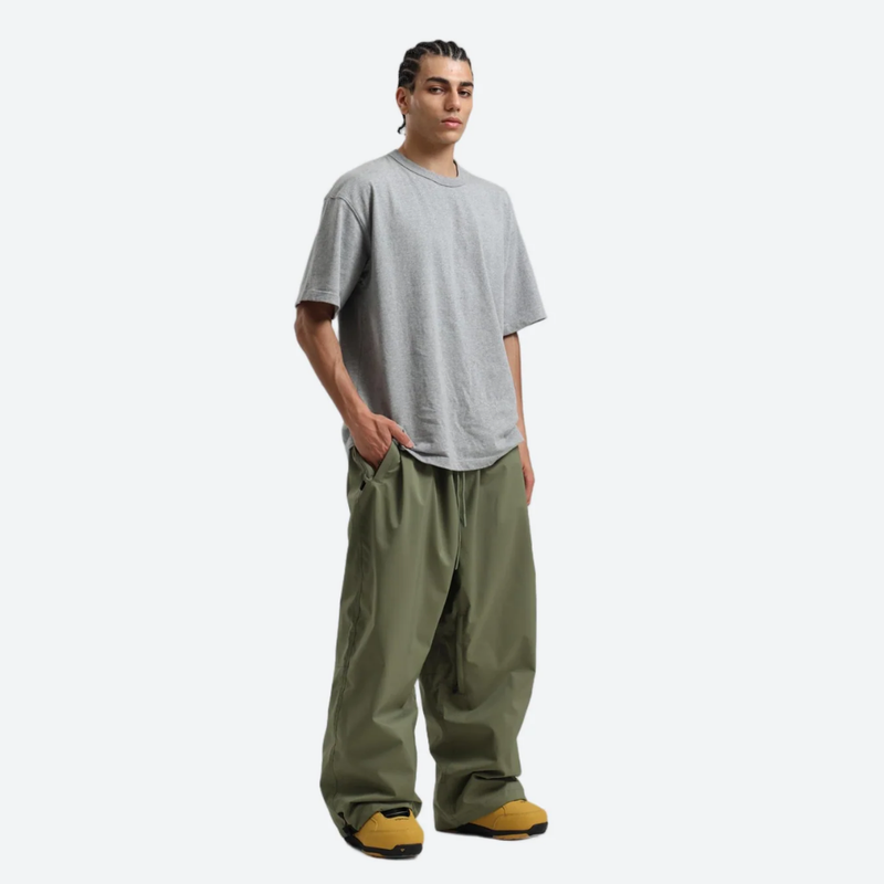 Men's breathable ski jacket with chest zip pockets - olive green snow pants with gray tee, for powder days and winter commute