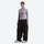 Women's breathable ski jacket with chest zip pockets - coffee brown snow pants with lavender top, on-model front view