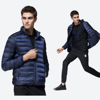 
                  
                    Men's ultra-light compact down mid-layer jacket - navy ultra-light down jacket on men, for layering in cold weather
                  
                