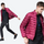 Men's packable windproof down jacket with stuff sack - magenta ultra-light down jacket on men, walking view with front inset