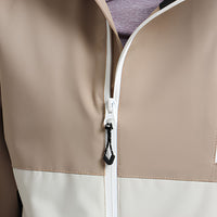 
                  
                    Women's breathable 2-layer snowboard jacket and pants - tan and cream, for cold-weather winter sports
                  
                