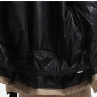 
                  
                    Women's colorblock ski jacket set - tan and cream, inner snow skirt close-up detail, for skiing and snowboarding
                  
                