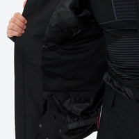 
                  
                    Men's 2-layer snowboard jacket and pants - black jacket, interior lining close-up with hand, for powder and piste riding
                  
                