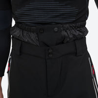 
                  
                    Men's 2-layer snowboard jacket and pants - black snow pants, waistband snap close-up detail, for skiing and snowboarding
                  
                