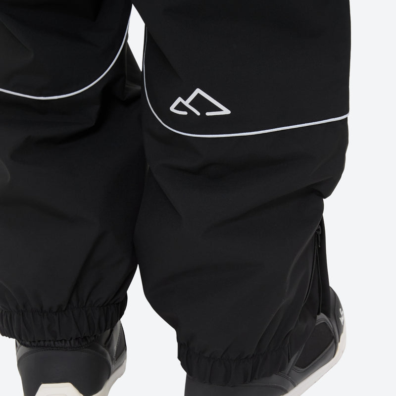 Men's 2-layer snowboard jacket and pants - black snow pants, leg logo print close-up detail, for cold-weather winter sports