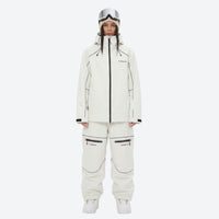 
                  
                    Women's waterproof 2L snow jacket and pants - white jacket with white pants, on-model front view, for resort and street wear
                  
                