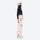 Women's waterproof 2L snow jacket and pants - pink snow pants with black top, on-model side view, for resort and street wear
