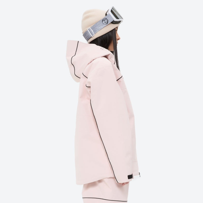 Women's 2-layer snowboard jacket and pants - pink jacket, on-model side view, for resort and street wear