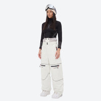 
                  
                    Women's 2-layer snowboard jacket and pants - white snow pants with black top, for skiing and snowboarding
                  
                