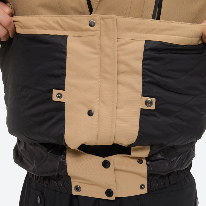 Men's 2-layer snowboard jacket and bib pants - tan jacket, inner snow skirt close-up detail, for powder and piste riding