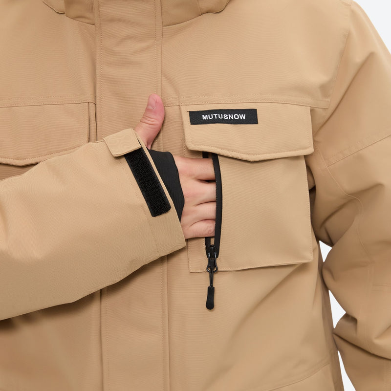 Men's breathable ski jacket with flap pockets - tan jacket, chest pocket close-up with hand, for skiing and snowboarding