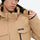 Men's breathable ski jacket with flap pockets - tan jacket, collar close-up with hand, for cold-weather winter sports