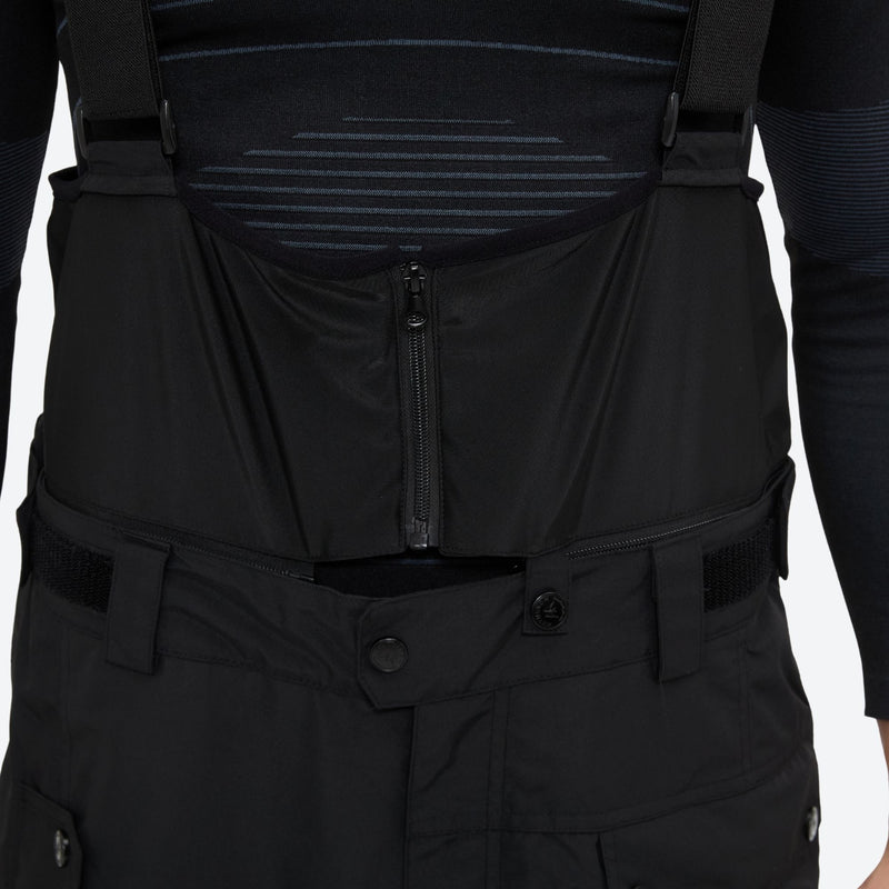 Men's 2-layer snowboard jacket and bib pants - black snow pants, waistband close-up detail, for resort and backcountry days
