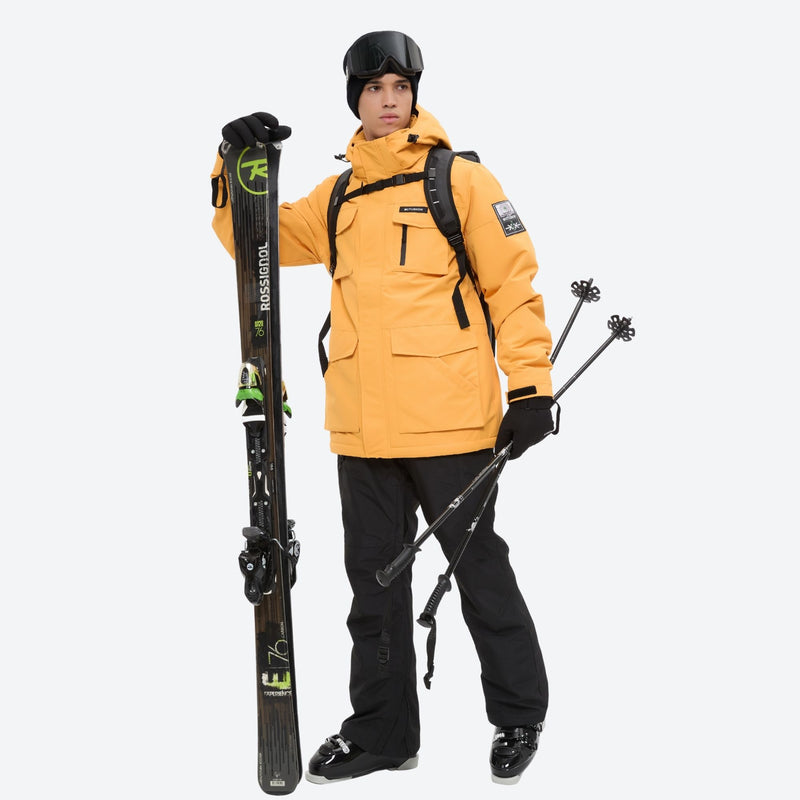 Men's waterproof 2L snow jacket and suspender pants - orange jacket with black pants, for resort and backcountry days