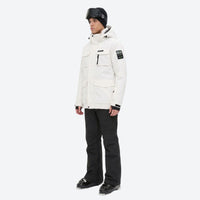 
                  
                    Men's 2-layer snowboard jacket and bib pants - white jacket with black pants, for resort and backcountry days
                  
                