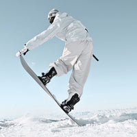 
                  
                    All-mountain snowboard with true twin shape - rider in white outfit, for winter snow sports
                  
                