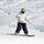 Freestyle twin tip snowboard for park and piste - rider in white jacket, for park and freestyle riding
