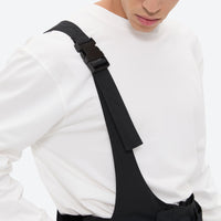 
                  
                    Breathable 3-layer suspender ski pants with cargo pockets - black, for cold-weather winter sports
                  
                