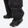 Unisex waterproof 3L bib snow pants - black, hem gaiter over boot side close-up detail, for cold-weather winter sports