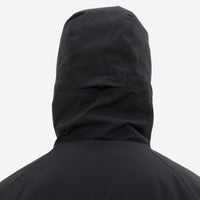 
                  
                    Men's 3-layer snowboard jacket and pants - black, on-model back hood view, for cold-weather winter sports
                  
                
