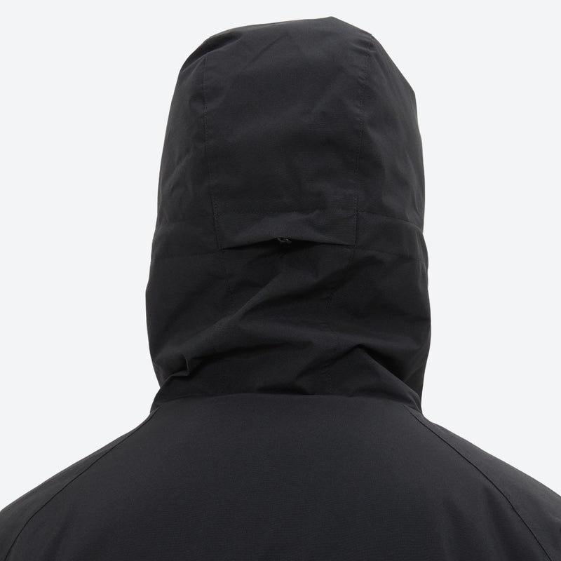 Men's 3-layer snowboard jacket and pants - black, on-model back hood view, for cold-weather winter sports