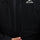 Men's 3-layer snowboard jacket and pants - black, chest zip close-up detail, for resort and backcountry days