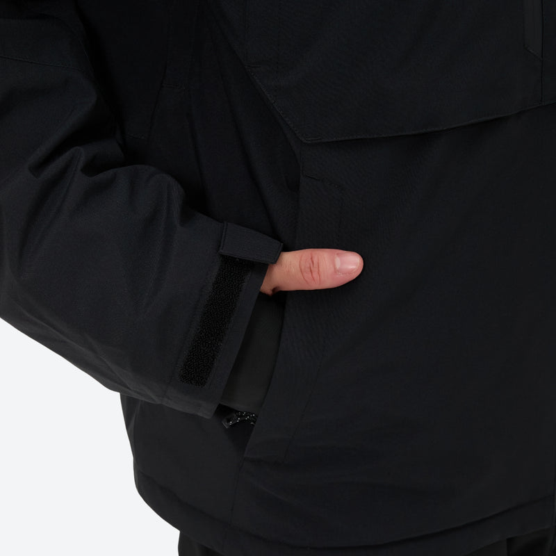 Men's breathable ski jacket and pants set - black, side pocket close-up with hand, for cold-weather winter sports