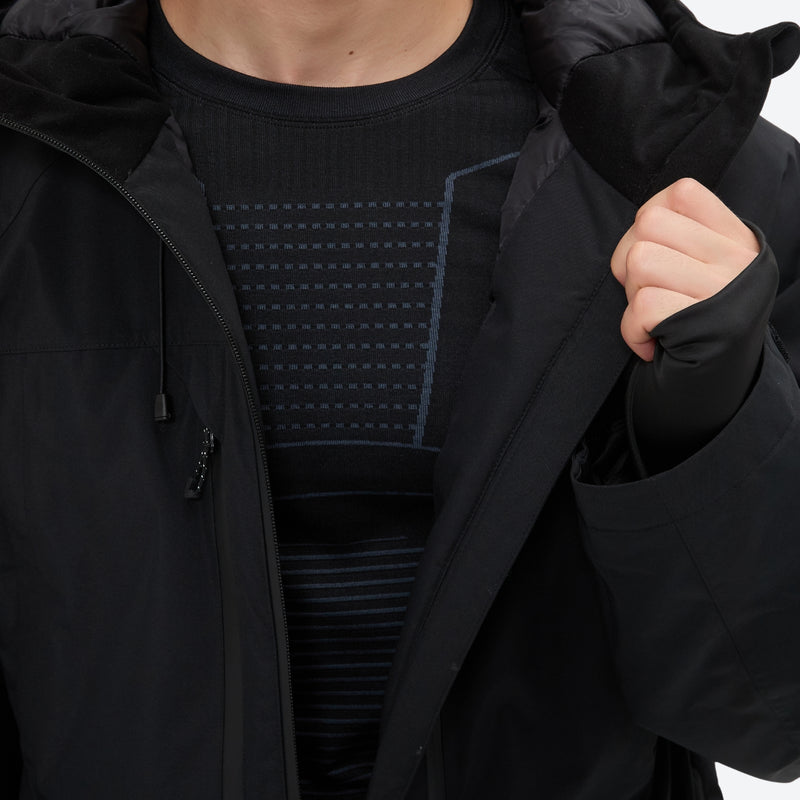 Men's breathable ski jacket and pants set - black, interior mesh pocket close-up with hand, for powder and piste riding